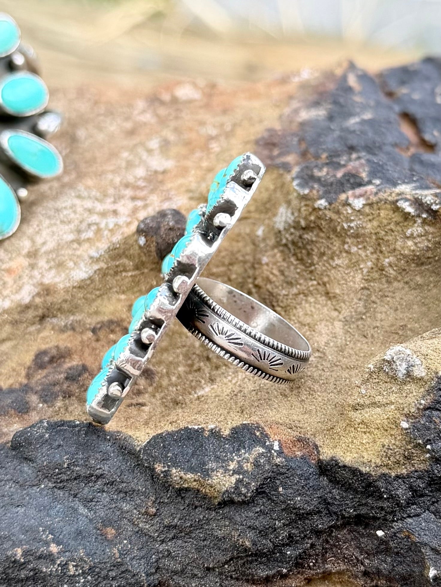 The stamped cluster ring