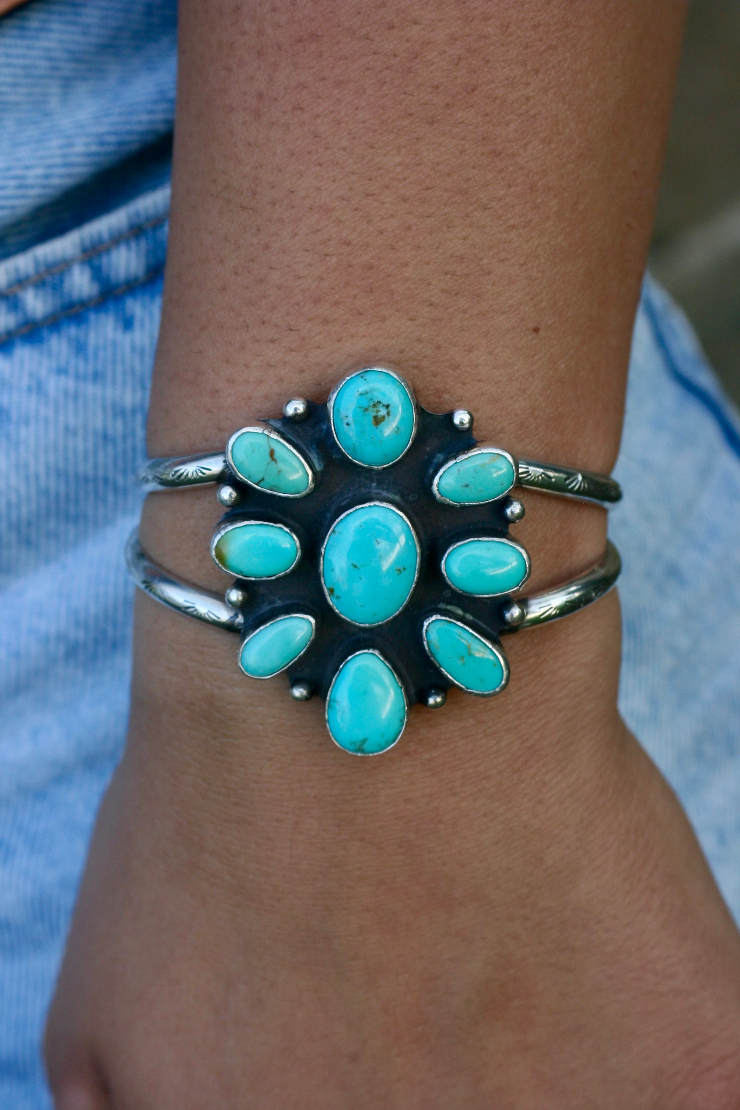 The stamped flower cuff