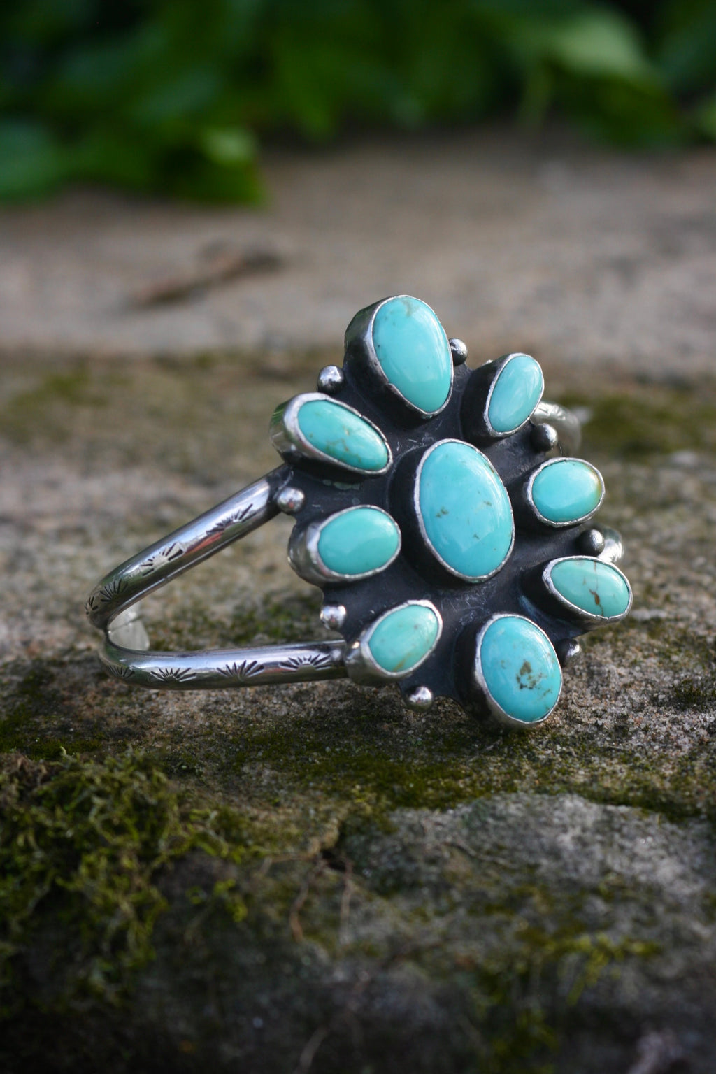 The stamped flower cuff