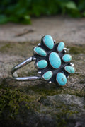 The stamped flower cuff